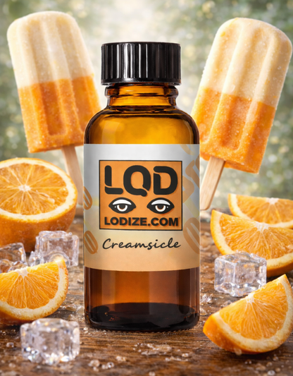 Bottle of LQD with creamsicle flavor liquidizer for wax to vape oil surrounded by orange slices and popsicles on a wooden surface.